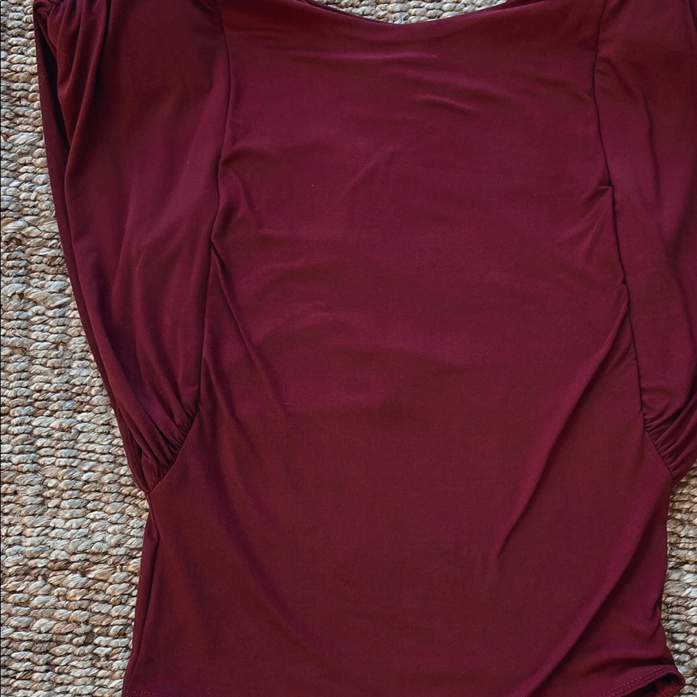 Dark Red Bodysuit with statement sleeves.